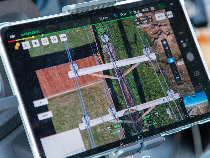CoServ’s DJI Matrice drone takes high resolution
photos of power lines to identify potential problems. Photo by KEN OLTMANN